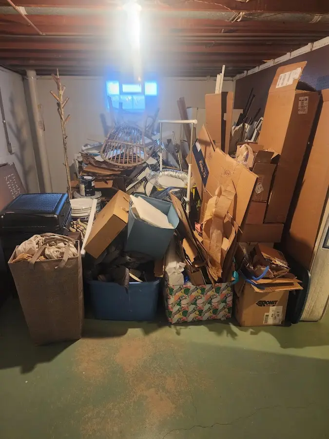 Roll-off dumpster container at job site for 2 Yard Dumpster Rental in Weston